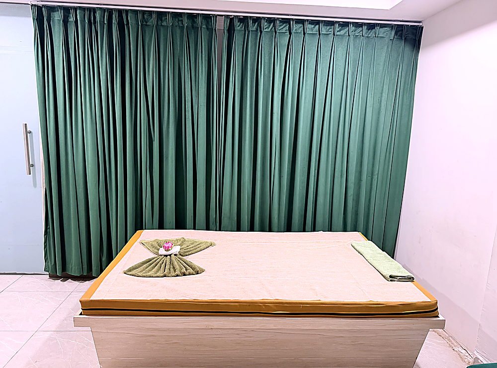 Spacious therapy bed with fresh linens
