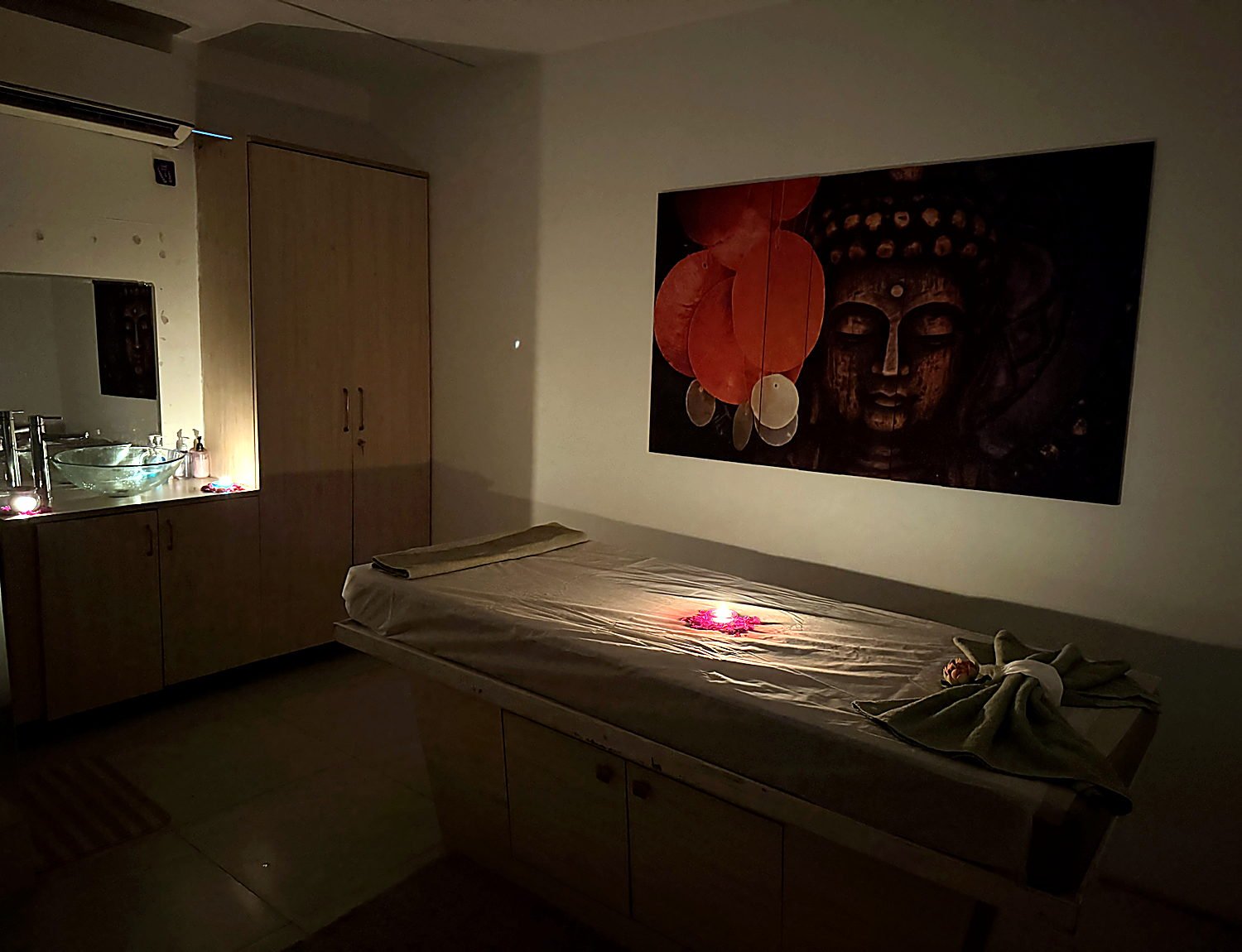 Candle-lit signature ritual room at Vaayu Wellness Spa